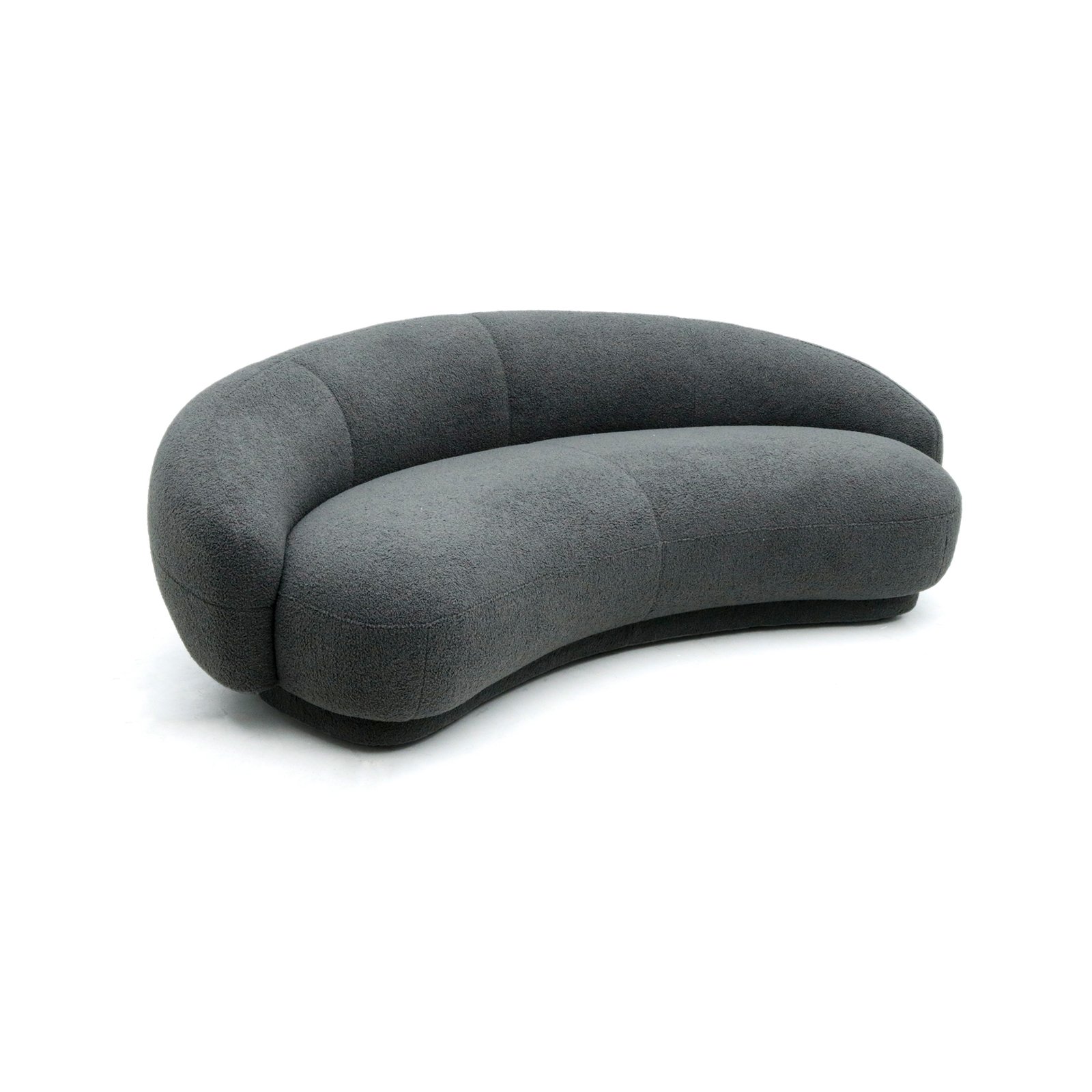 Julep Sofa with rounded backrest, sculptural curves, and soft fabric upholstery in modern minimalist style.
