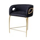 Side view of Chandra Bar Stool with polished brass frame and curved upholstered seat