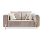 Designer sofa with fold-wrinkle front detail and tufted armrests