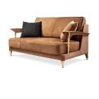 Designer nubuck leather sofa with brass details shown from angle