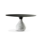 Aqua Dining Table by Roche Bobois with marble droplet base and black marble top in modern sculptural design.