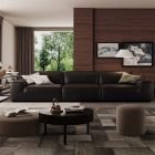 Avanue Sofa in top-grain leather with curved lines and vintage-inspired minimalist design.