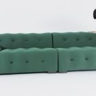 Blogger Sofa with tufted green or grey upholstery and modern design.