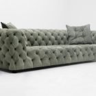 Moon Surface Sofa by Baxter with hand-tufted natural leather and sculptural curves.