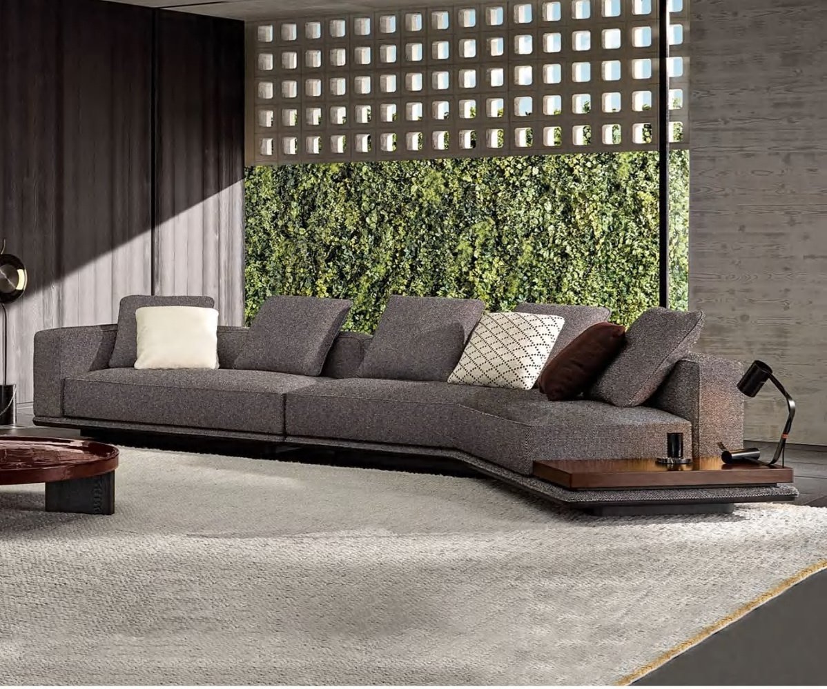 Horizonte Sofa in light fabric with modular design and integrated marble side platform.