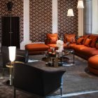 Elegant Stiletto Armchair Side Profile with Curved Back and Metal Base