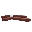 Surf Modular Sofa with curved modern design and deep cushioned seating in a contemporary living space.